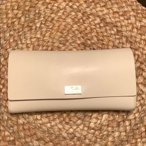 Kate Spade: Large Flap Wallet with Snap Closure